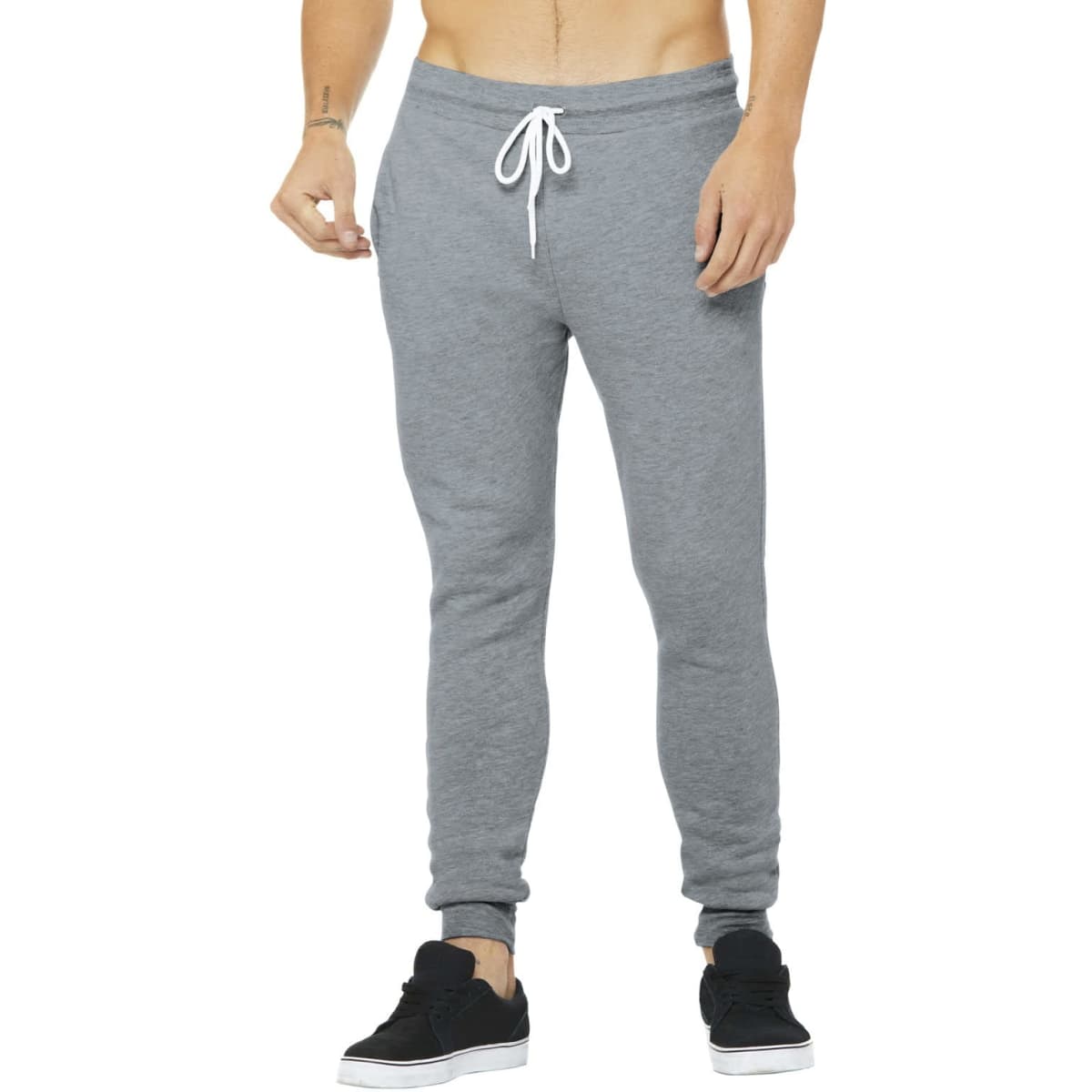 Unisex jogger sweatpants in grey, featuring a drawstring waist and tapered legs, with a logo on the leg.