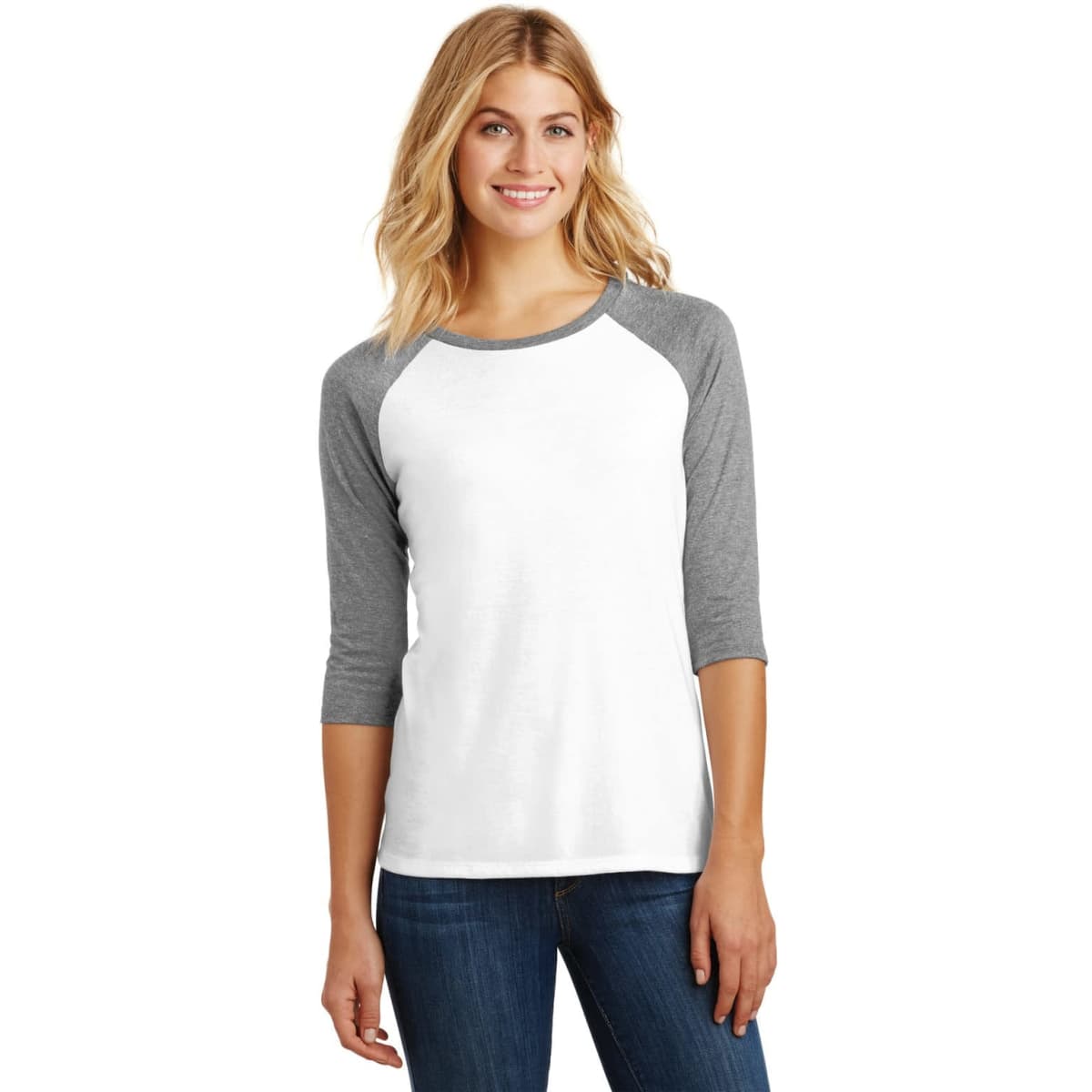 A white and grey 3/4-sleeve raglan shirt with a relaxed fit, displayed on a model. It has a logo present.