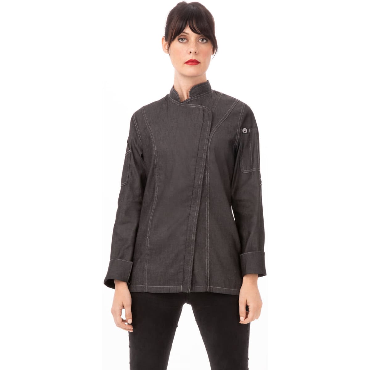 A black denim chef jacket featuring a modern design and a logo, displayed on a model.