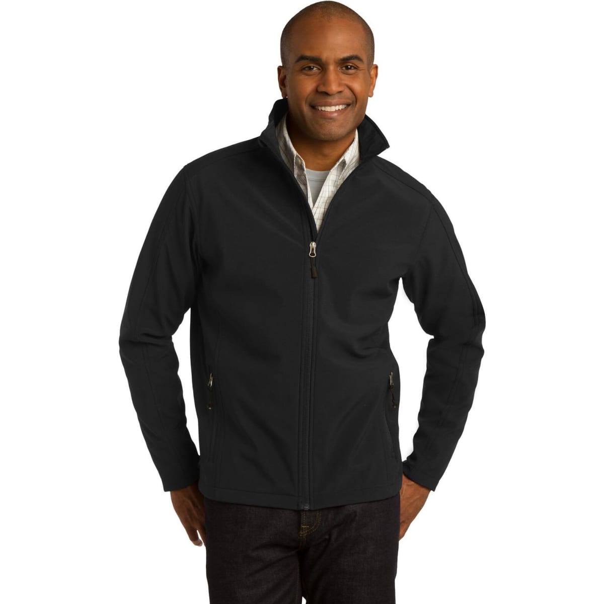 A man wearing a black soft shell jacket with a zippered front and side pockets, featuring a logo.