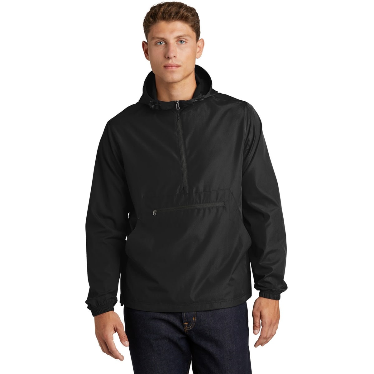 A black Sport-Tek Packable Anorak, featuring a front zipper and a hood, presented on a model.