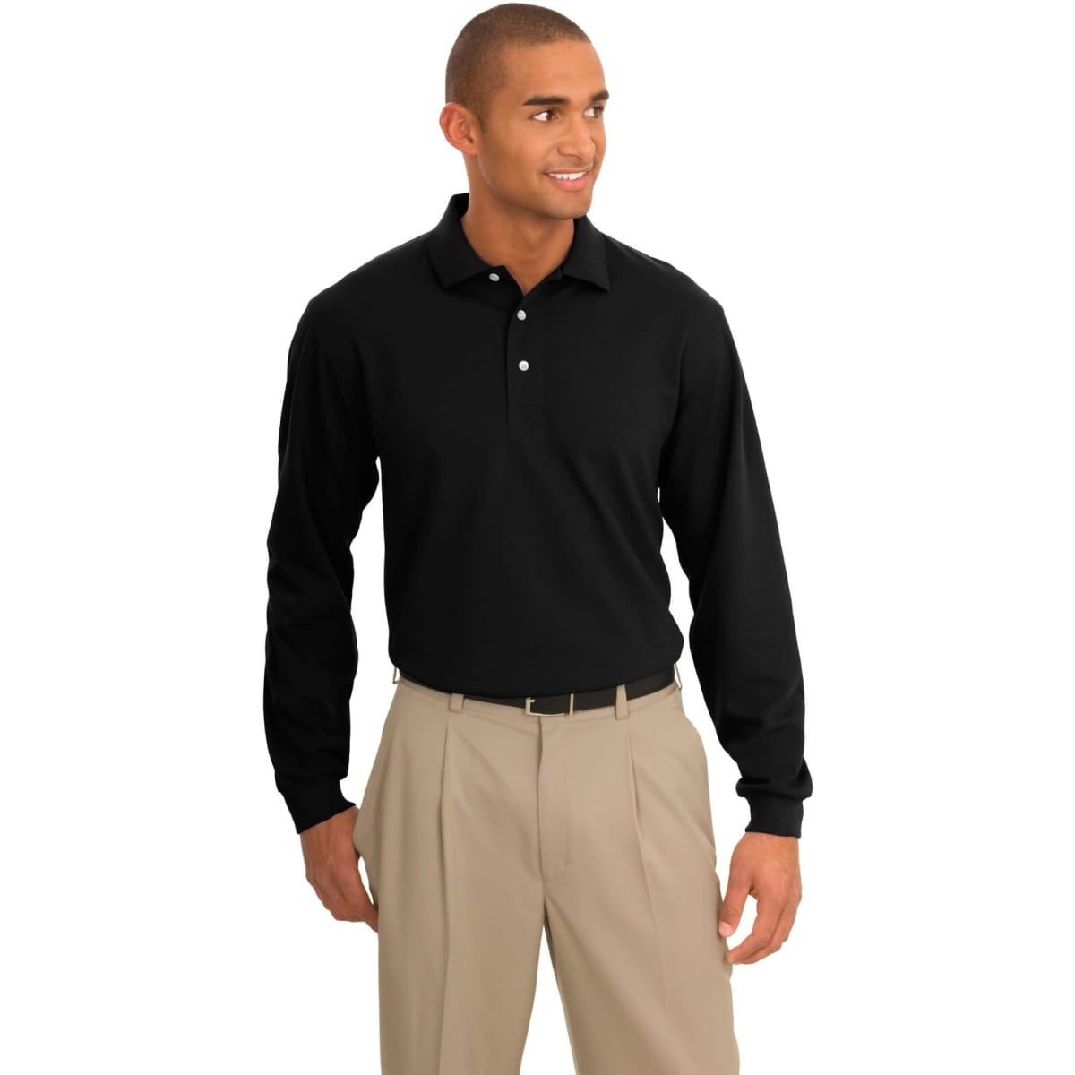 A long sleeve polo shirt in black, featuring a collar and buttons, worn with beige trousers. It has a logo on it.
