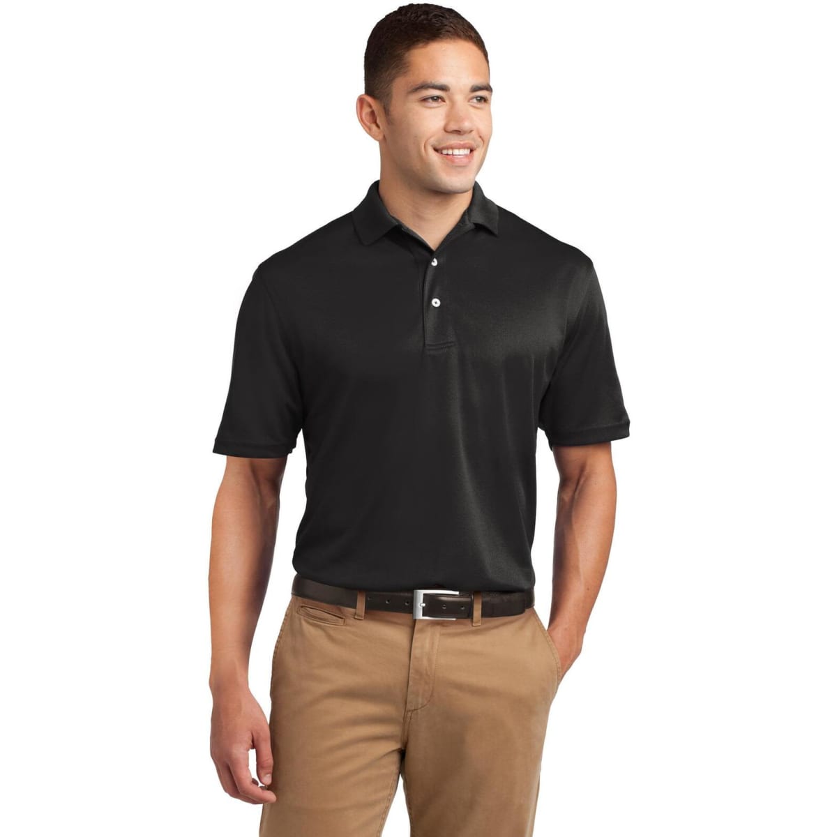 A man wearing a black Sport-Tek Dri-Mesh polo shirt, paired with light brown trousers, with a logo on the shirt.