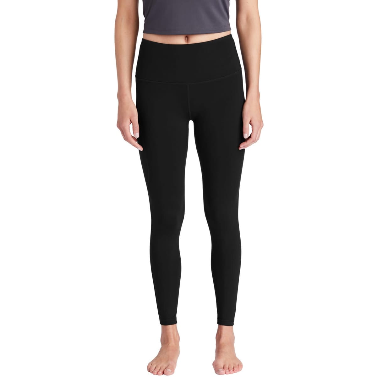 A pair of high-rise black leggings with a fitted design and no visible logos or branding.