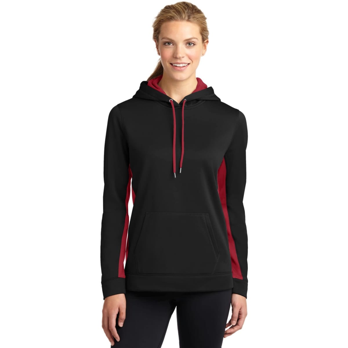 A black and red hooded pullover featuring a colourblock design and a front pocket, with a logo on it.