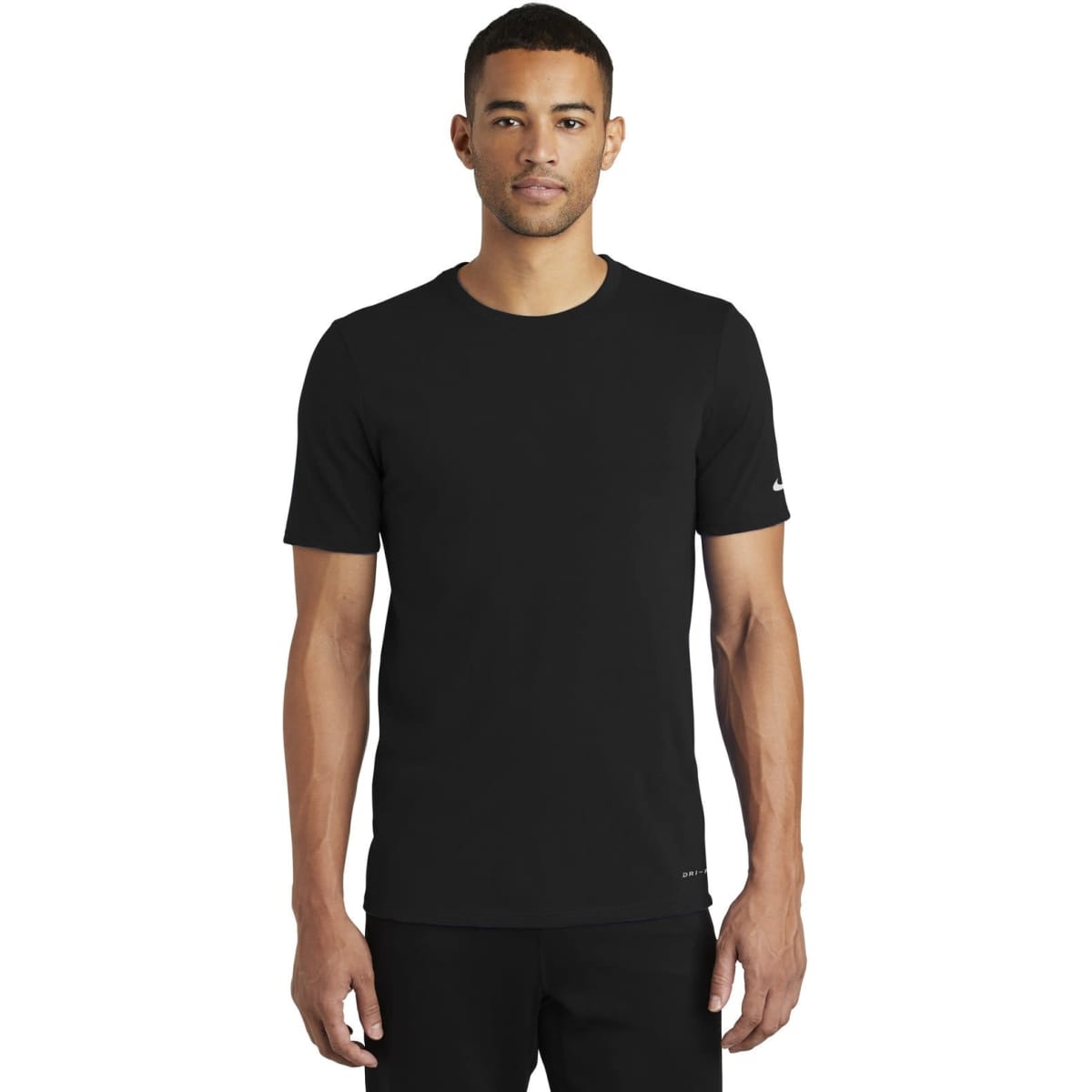 A black Nike Dri-FIT cotton/polyester t-shirt displayed on a model, featuring short sleeves and a logo.