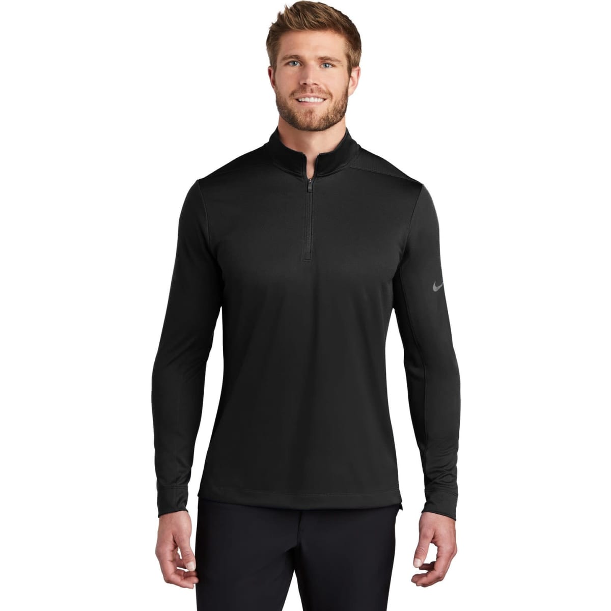 A black half-zip cover-up featuring long sleeves and a logo on the sleeve.