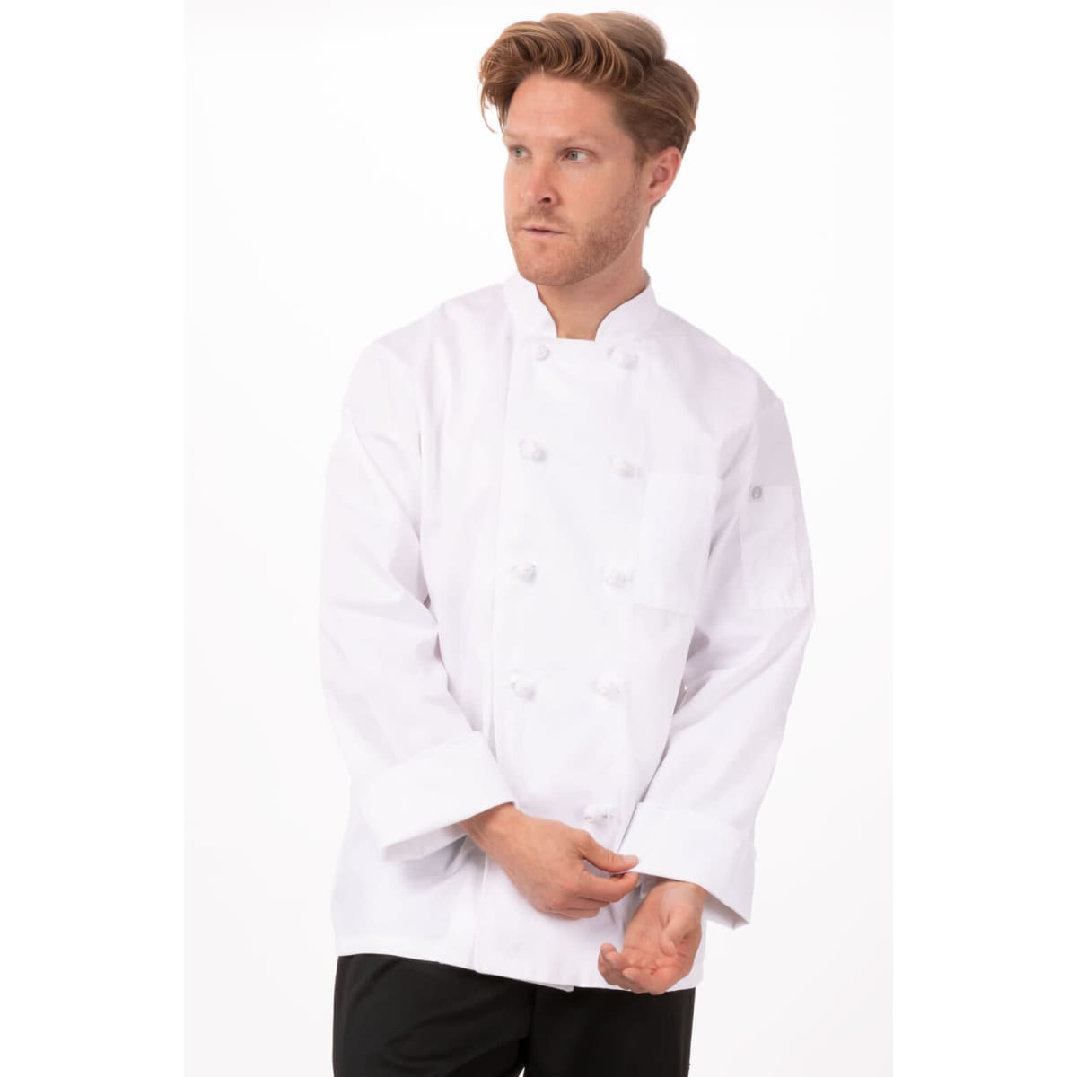 A man in a white chef jacket with a classic double-breasted design, featuring a logo on the chest.