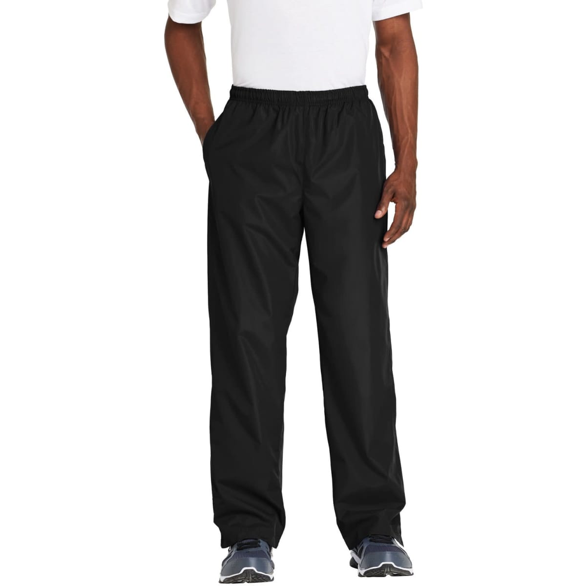 Black Sport-Tek Wind Pants featuring an elastic waistband and side pockets, suitable for athletic wear.