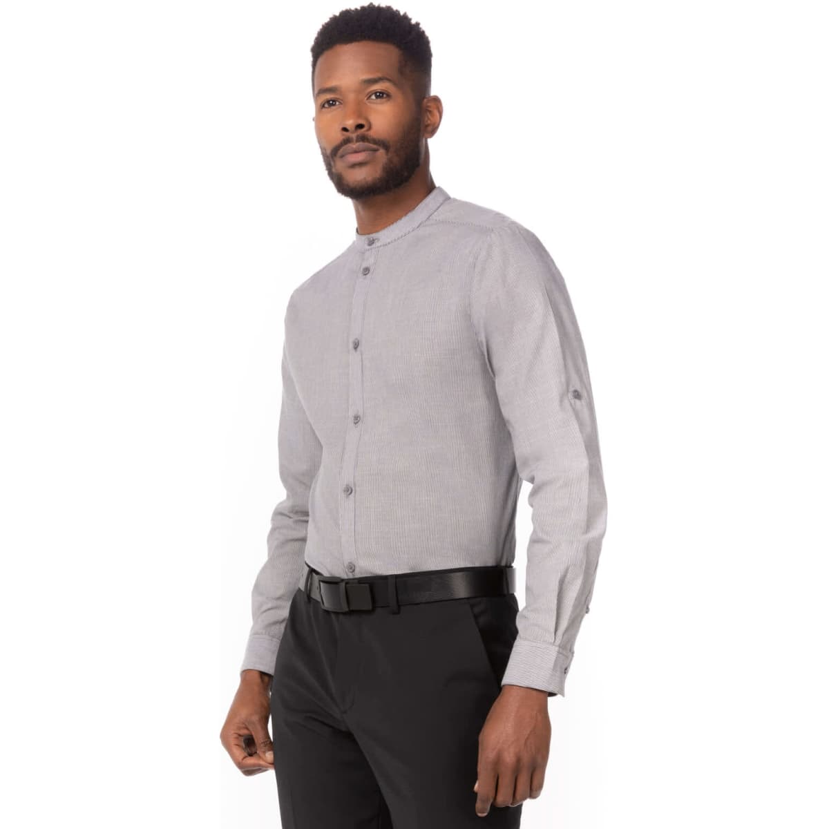 A button-up shirt in grey, featuring a collarless design and long sleeves, worn with black trousers.