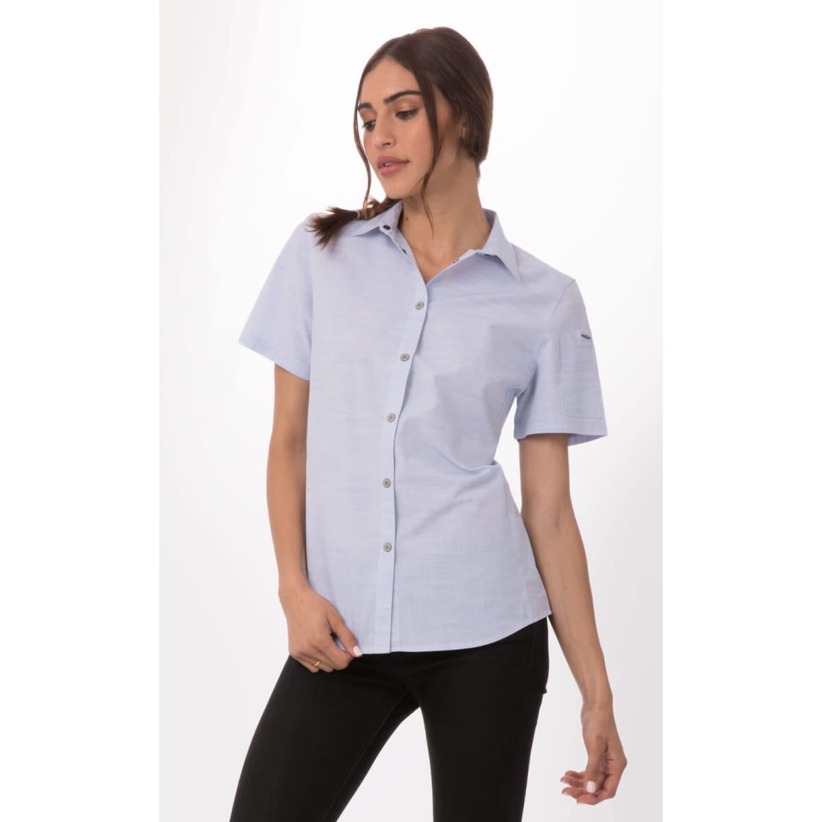A button-up women's shirt in light blue with short sleeves, featuring a branded logo.