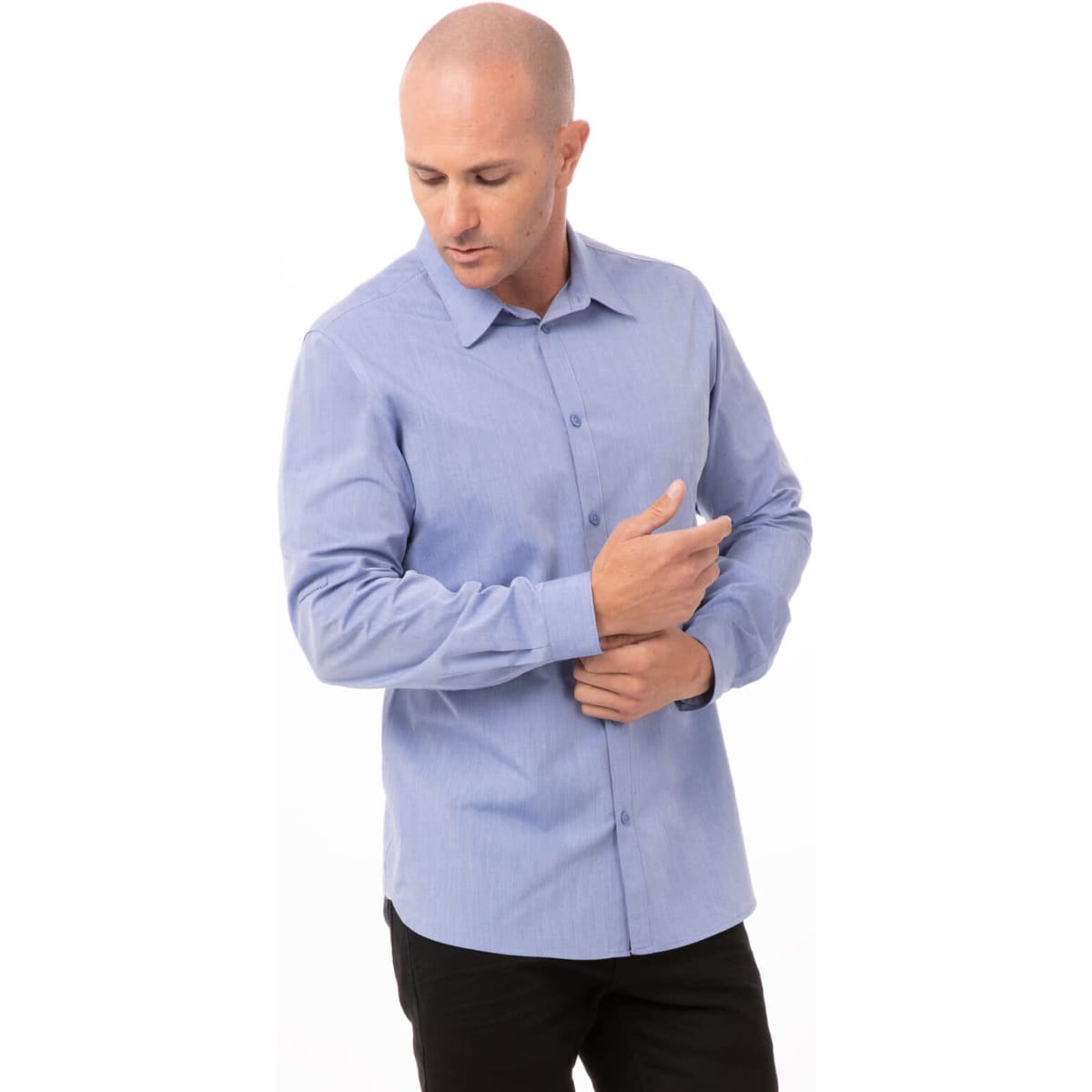 A men's button-up dress shirt in light blue chambray, featuring long sleeves and a button-down collar.