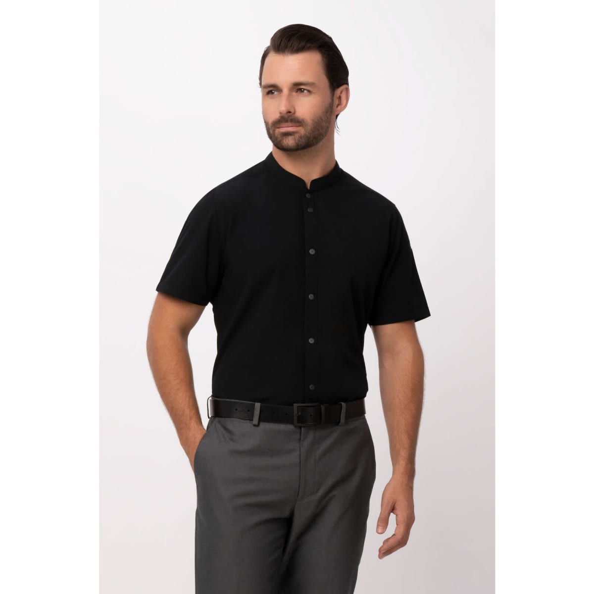 A black button-up men's shirt with short sleeves, styled with a collar and a belt, against a neutral background.