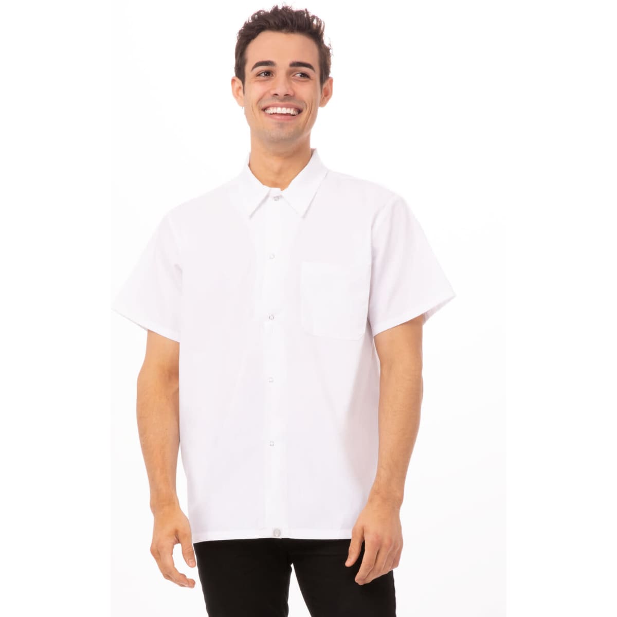 A white short-sleeved chef shirt with a front pocket, worn by a smiling male model. The shirt features a logo.