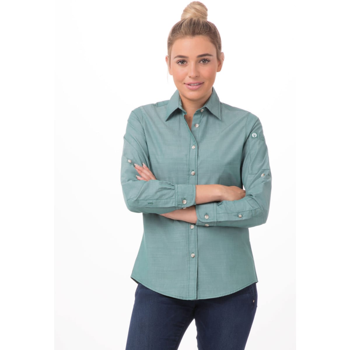 A chambray women's shirt in a teal colour, featuring long sleeves and a button-up front, displayed on a model.