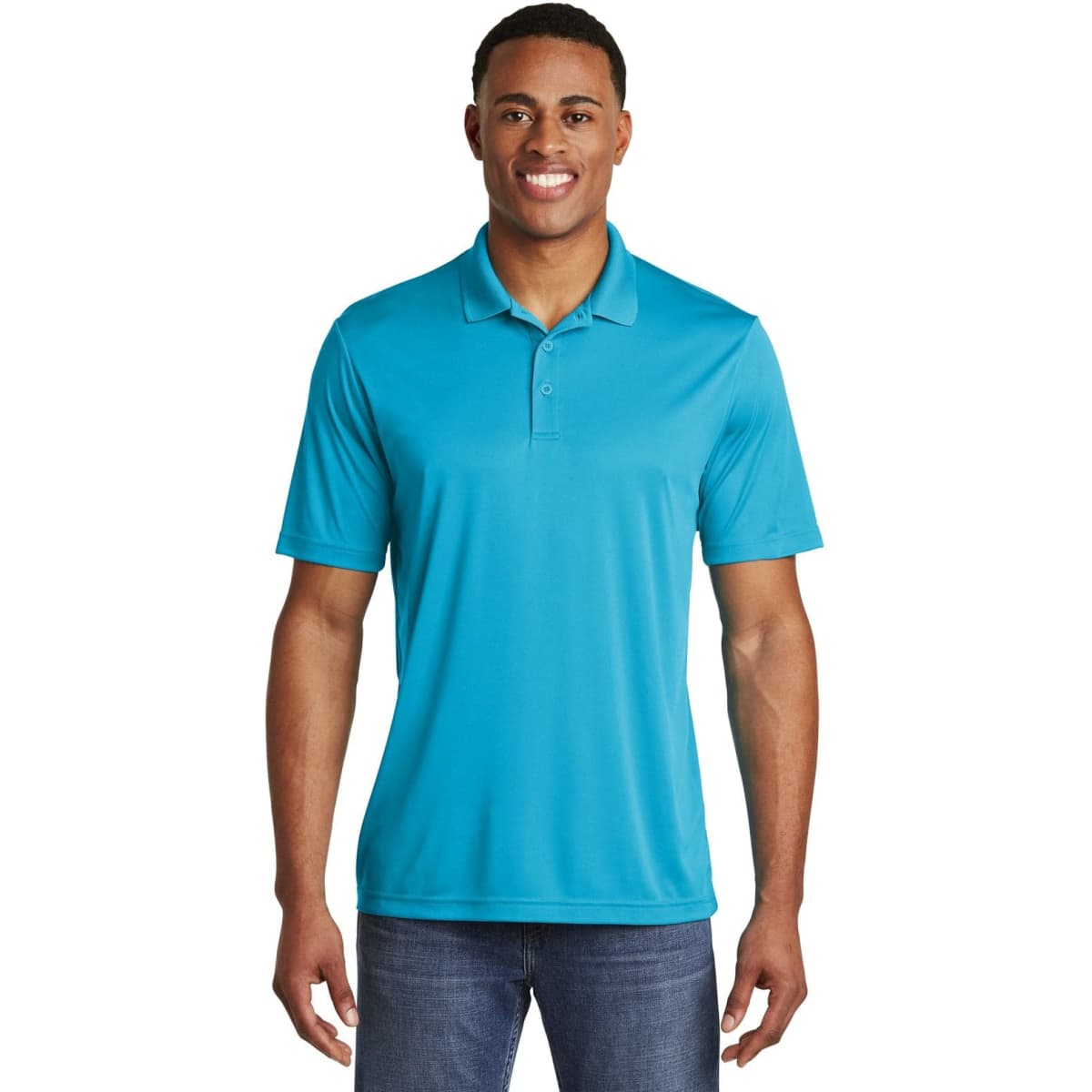 A blue polo shirt featuring a collar and short sleeves, displayed on a smiling model. The shirt has a logo.