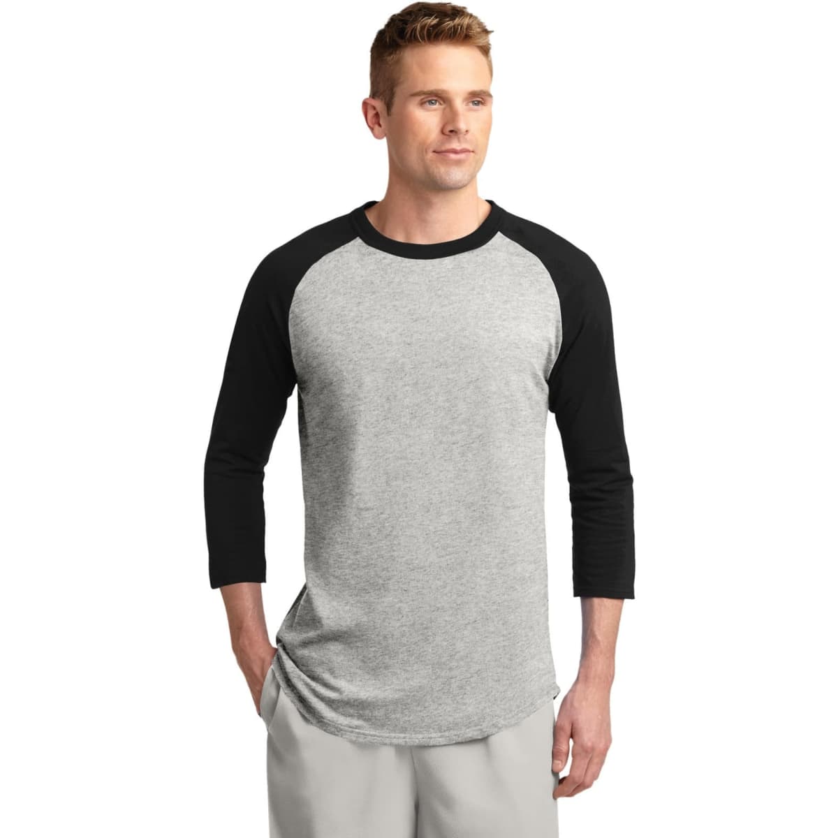 A grey and black Sport-Tek Colorblock Raglan Jersey with three-quarter sleeves and a logo on the chest.