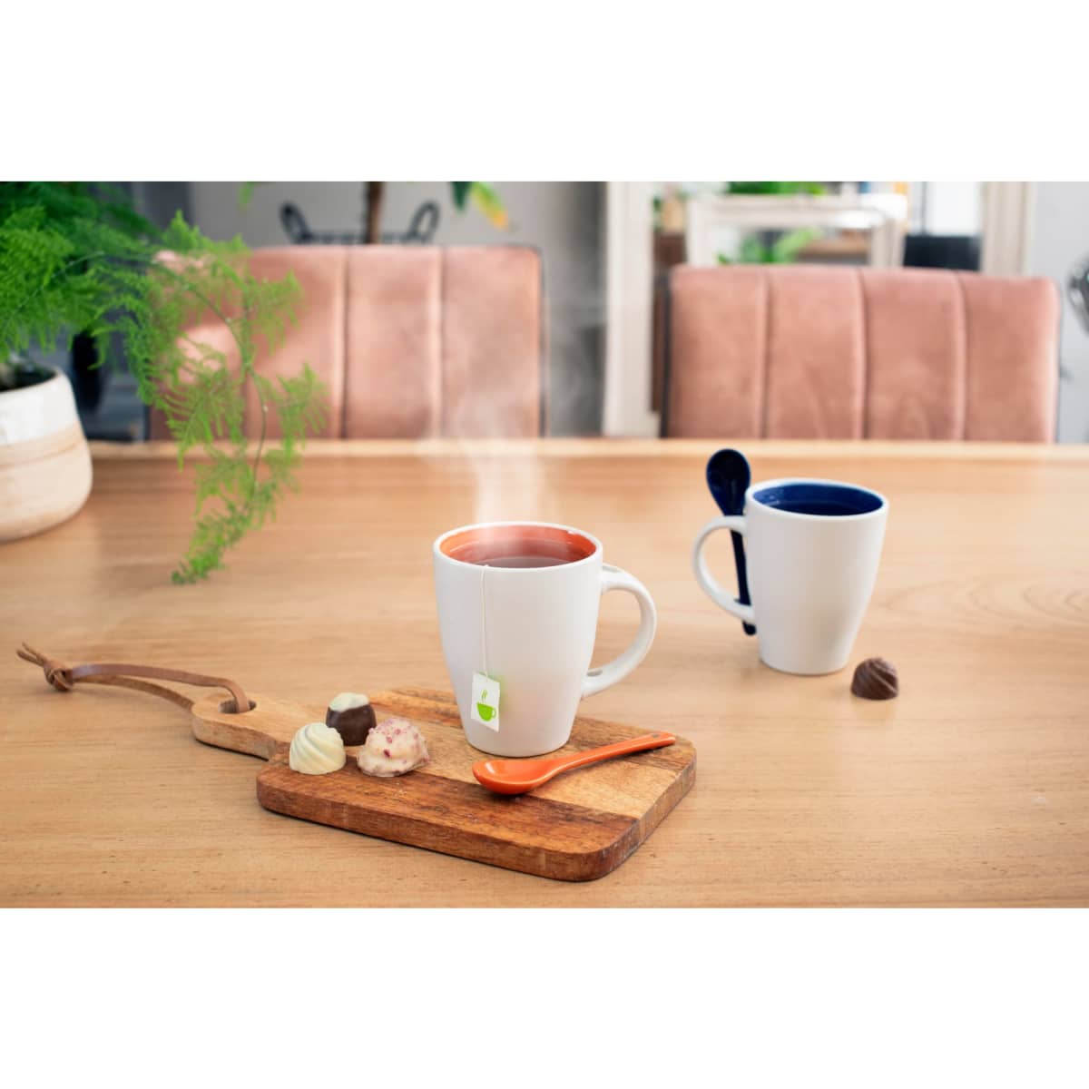 Ceramic mug with spoon