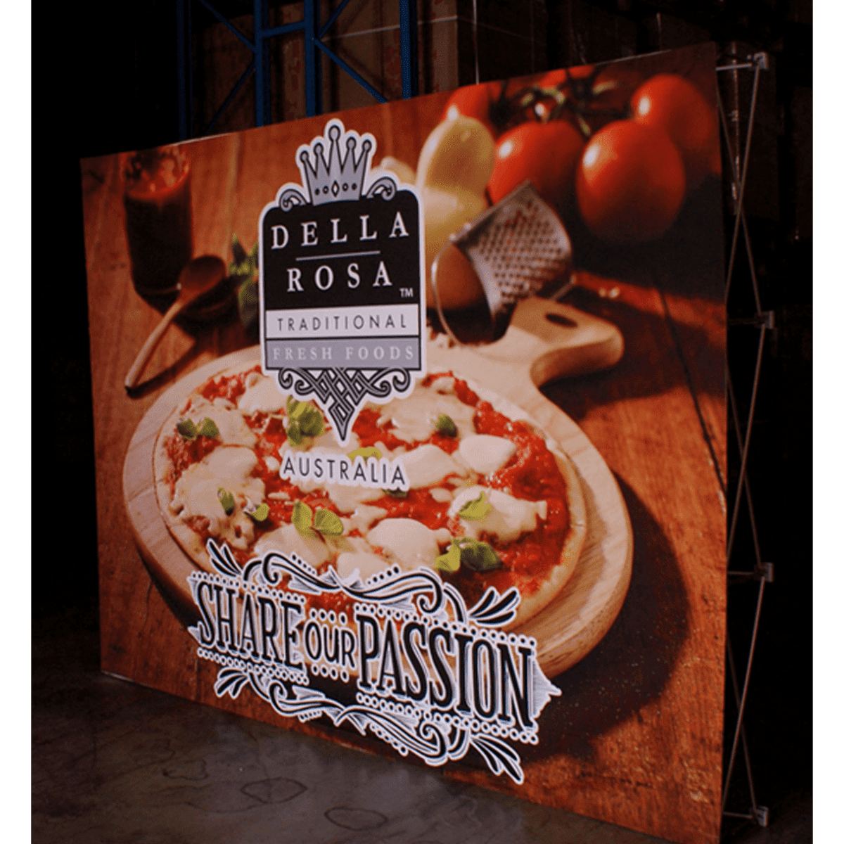 A display banner featuring a vibrant pizza image, with a logo and decorative elements in black and white.