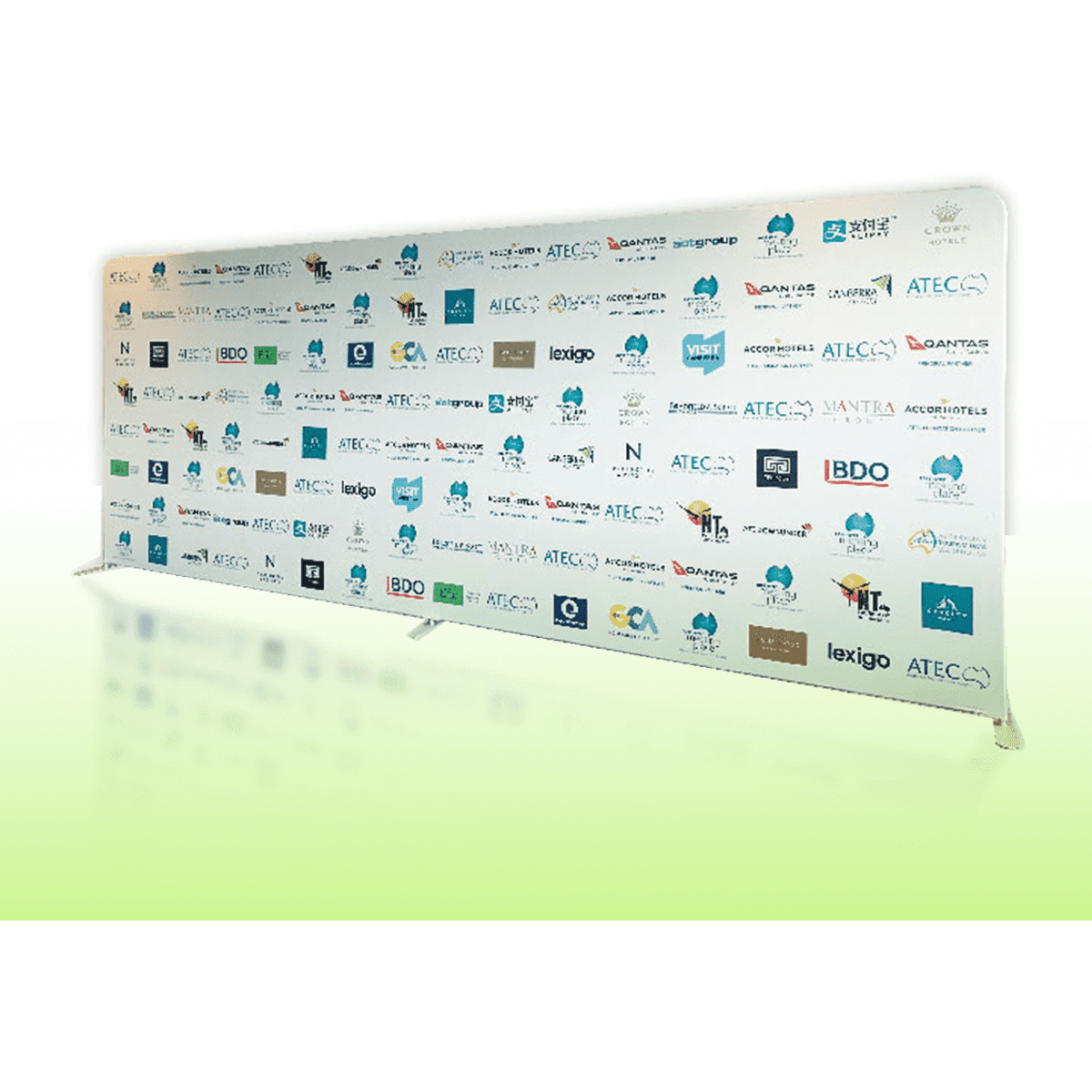 A media banner wall featuring a straight backdrop in white, displaying various logos and branding.