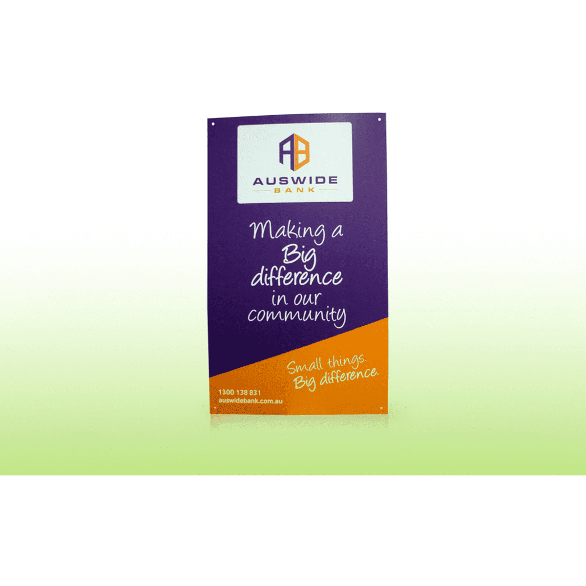 A corrugated signboard featuring purple and orange colours with a logo, promoting community engagement.