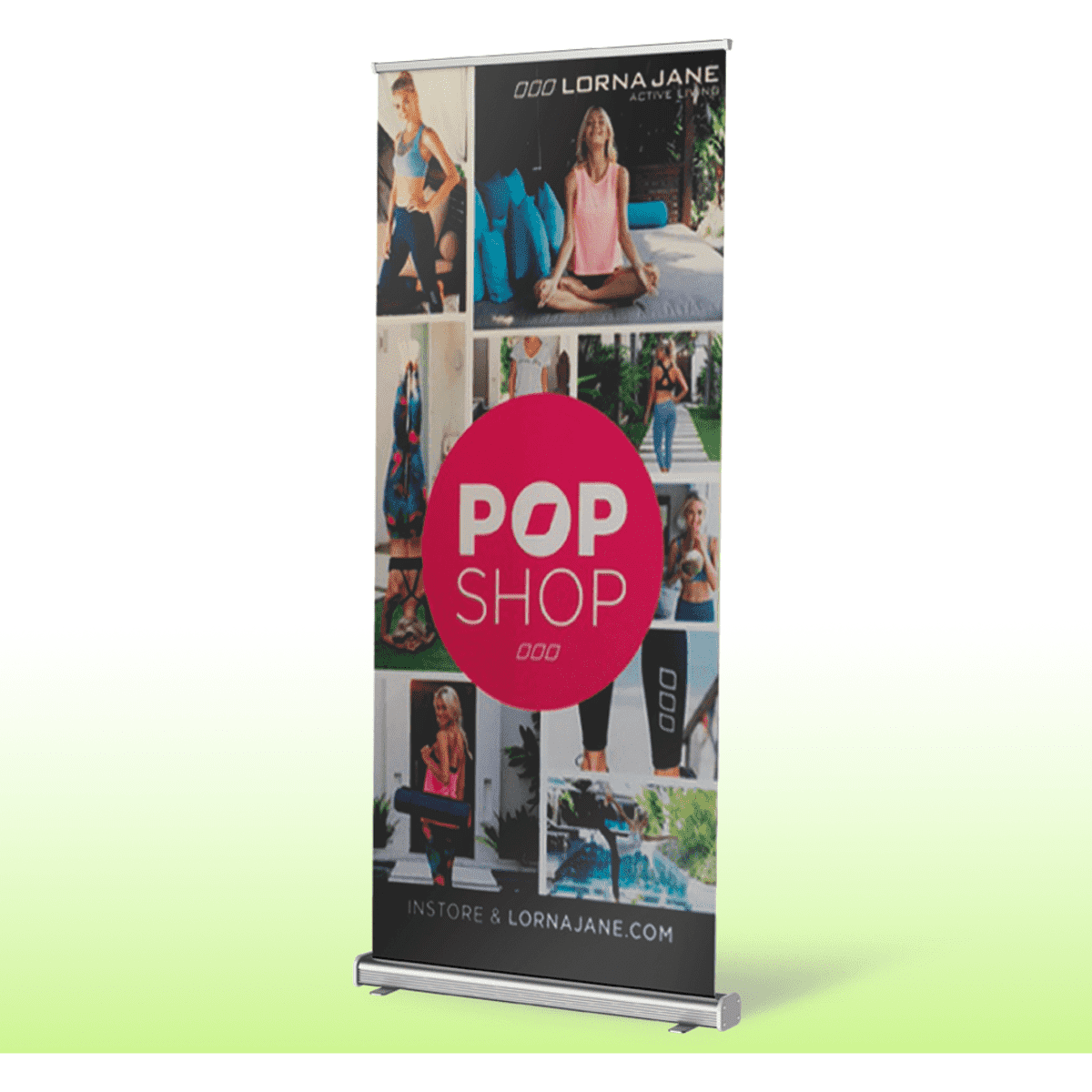 A pull-up banner with a standard base, featuring various images and a prominent pink circle logo.