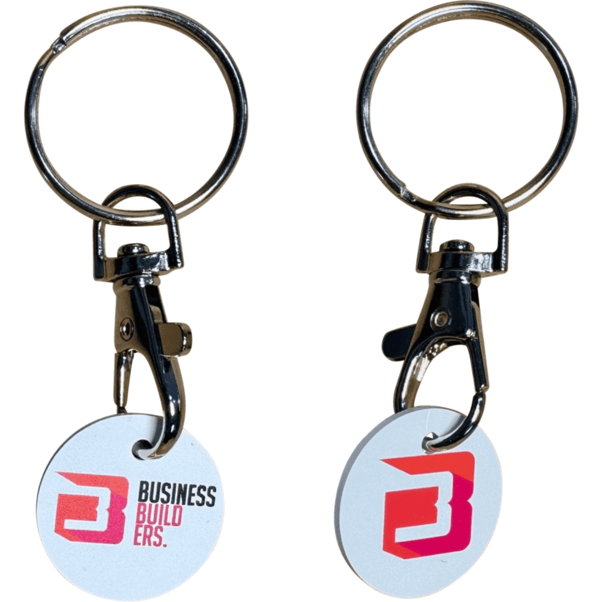 A keyring with a carabiner clip and two-sided printed coin featuring a logo in pink and white.