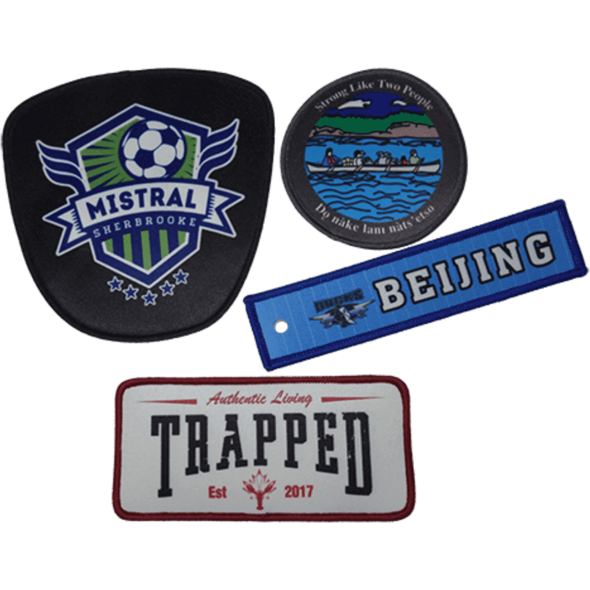 Custom embroidered patches in various shapes and colours, featuring designs and a logo.
