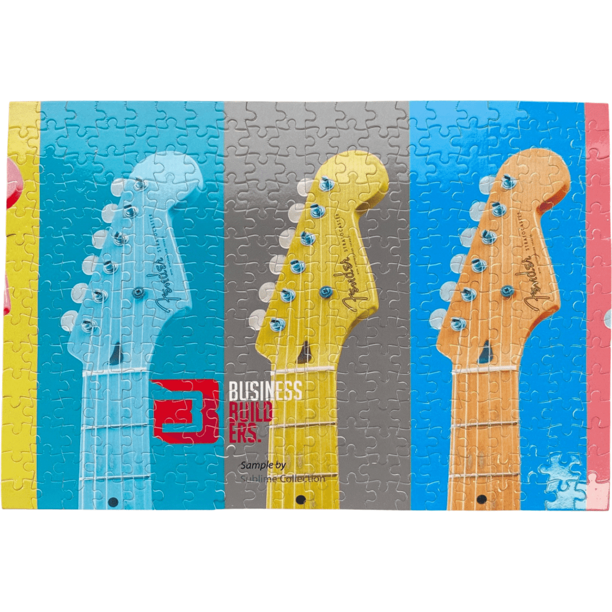 A large jigsaw puzzle featuring colourful guitar necks in blue, yellow, and grey, with a logo displayed on it.