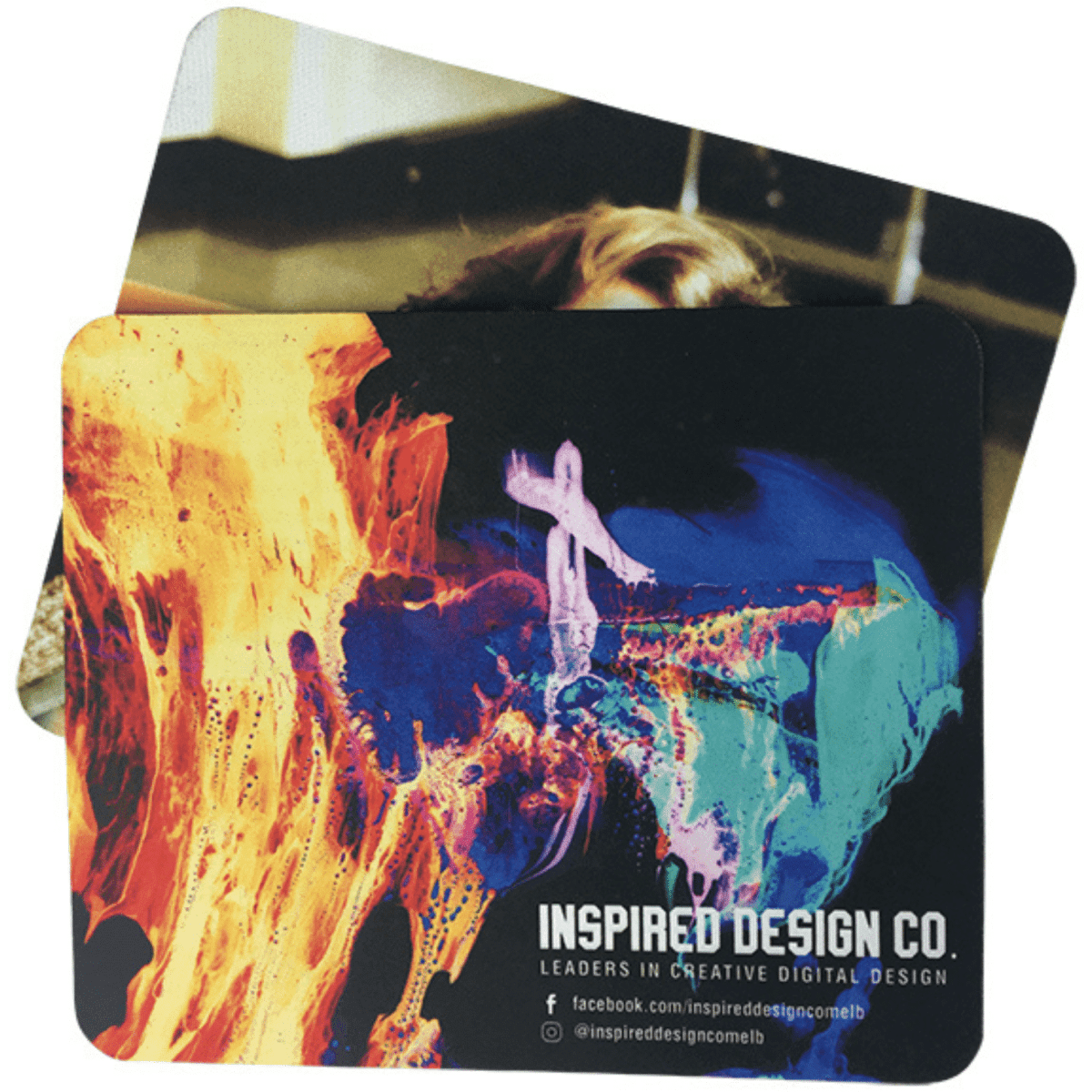 A mouse mat featuring vibrant, multi-coloured abstract designs and a branding logo.