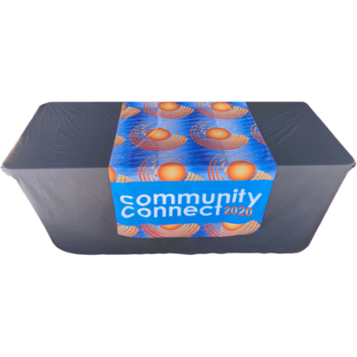 A table with a vibrant blue sublimated table runner featuring a sun design and a logo.