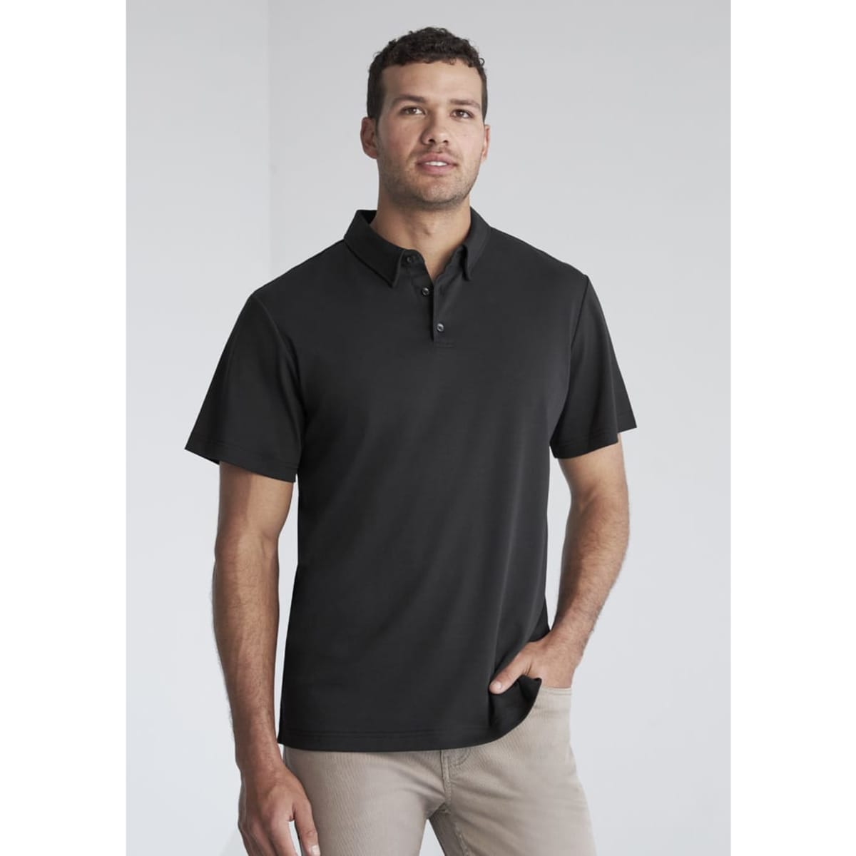 A black short sleeve polo shirt with a collar and three buttons, featuring a logo.