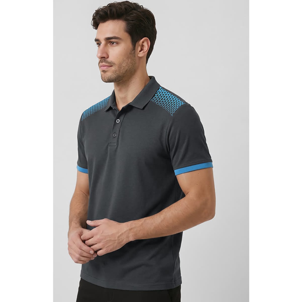 A grey men's short sleeve polo with blue accents and a textured design on the shoulders, featuring a logo.