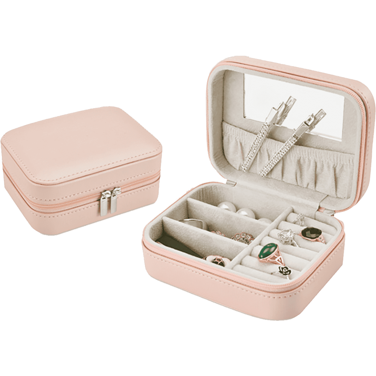 A pink jewellery box with a zip opening, featuring compartments for rings and a mirror inside.
