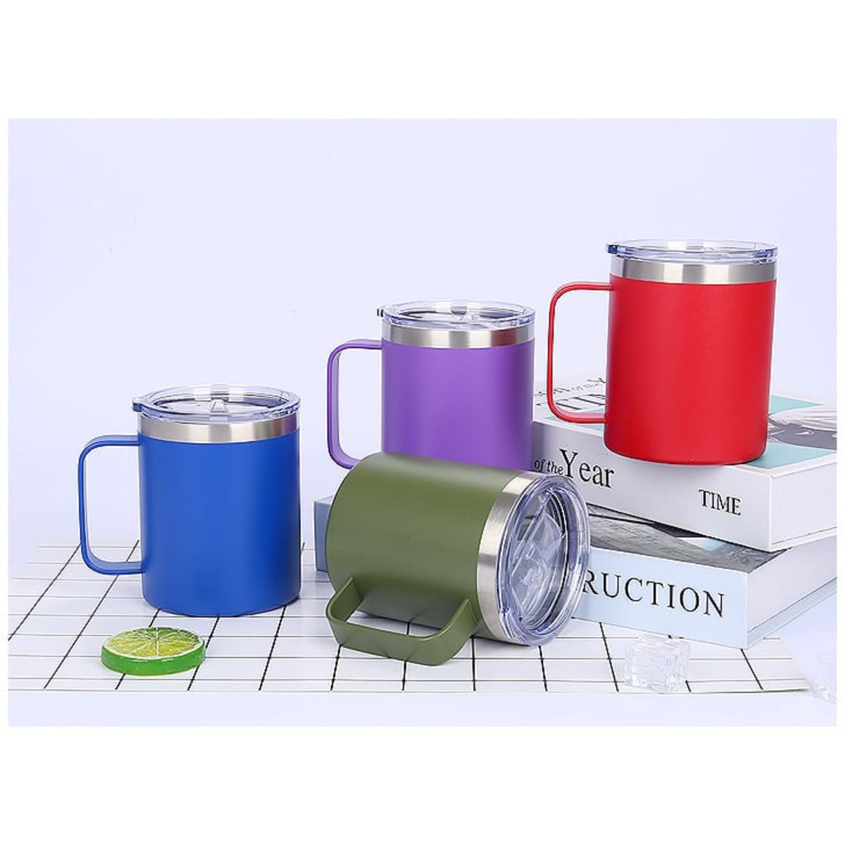 A drink bottle collection featuring four stainless steel mugs in blue, purple, red, and green, with clear lids and handles.