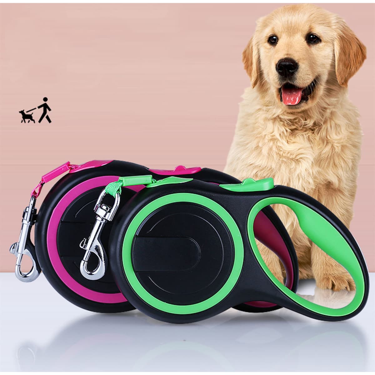 A pet telescopic leash in black with green and pink accents, alongside a golden retriever puppy. Featuring a branding logo.