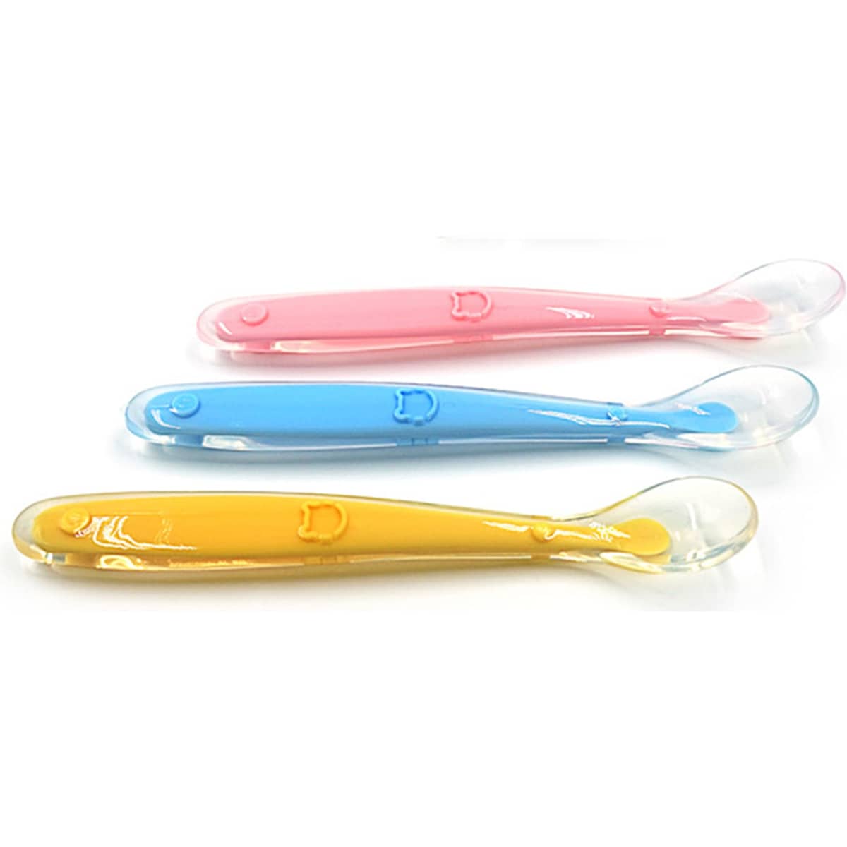 Three baby training spoons in pink, blue, and yellow, featuring a soft, curved design and a small handle.