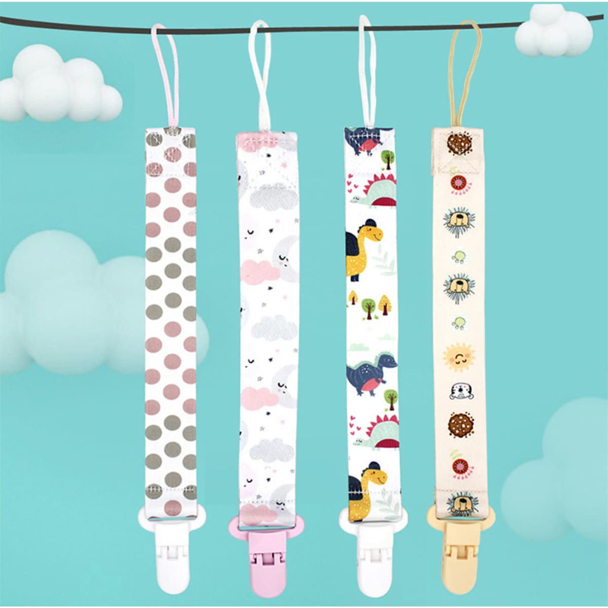 A baby pacifier chain holder set with four colourful designs featuring polka dots, clouds, dinosaurs, and sun motifs.