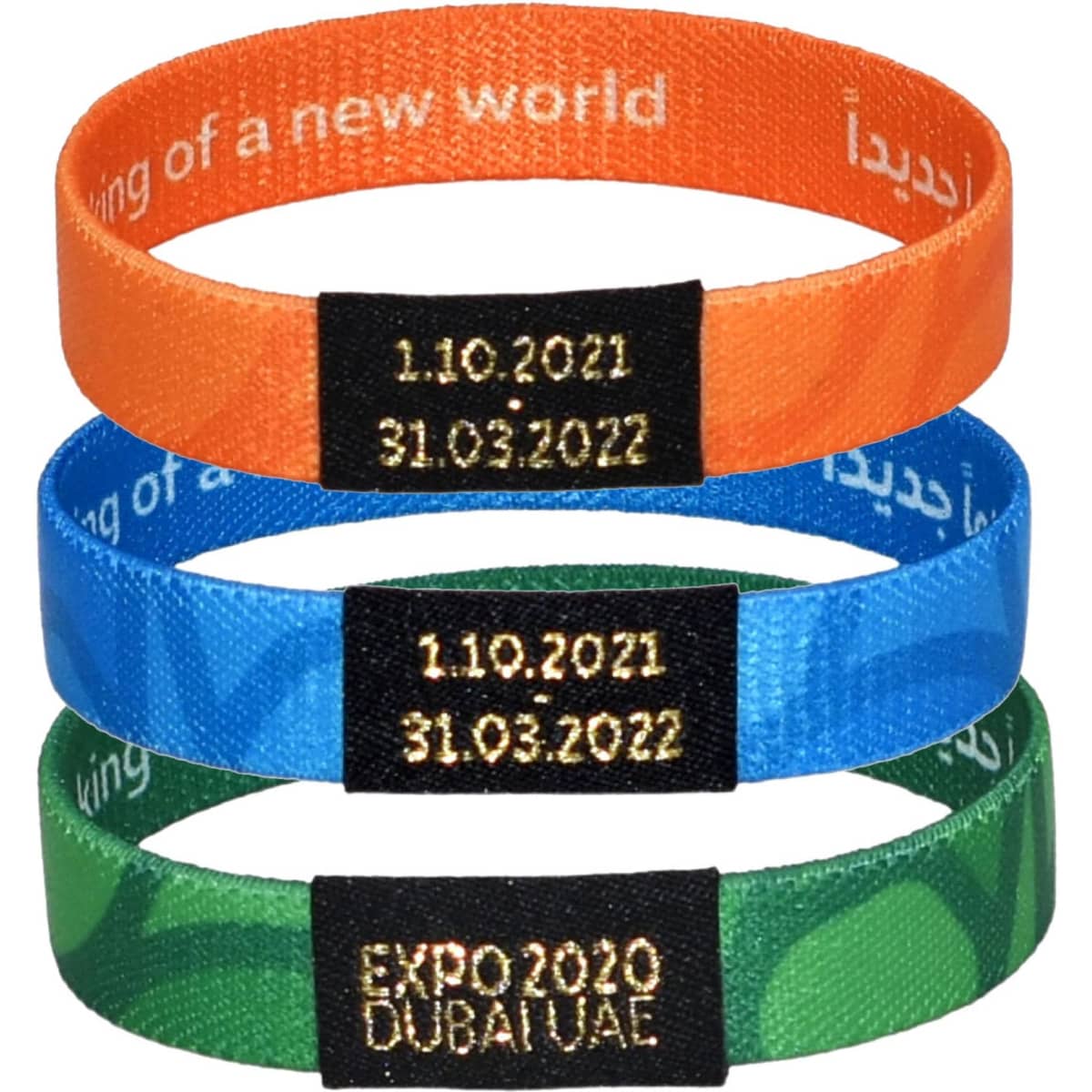 Three elastic wristbands in orange, blue, and green, each featuring a black logo and dates embossed on a label.