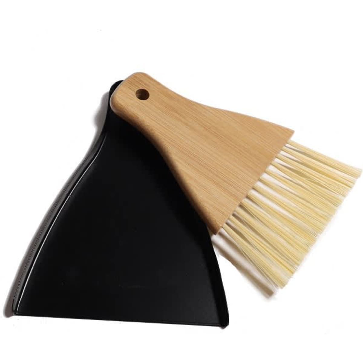 A bamboo brush and black dustpan set, featuring a natural wood handle and bristles.