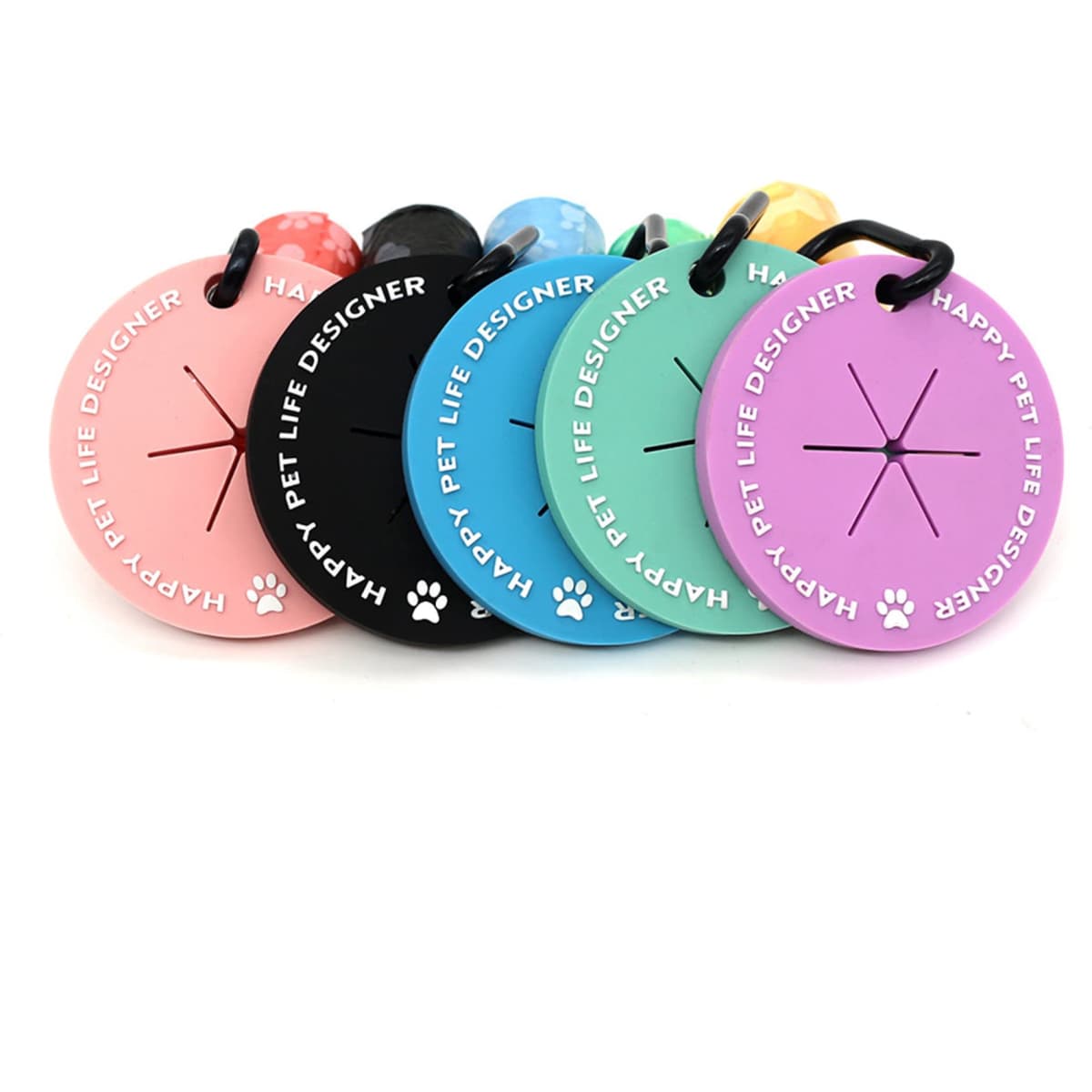 A set of pet tags in pink, black, blue, green, and purple with a logo, featuring a paw print design.