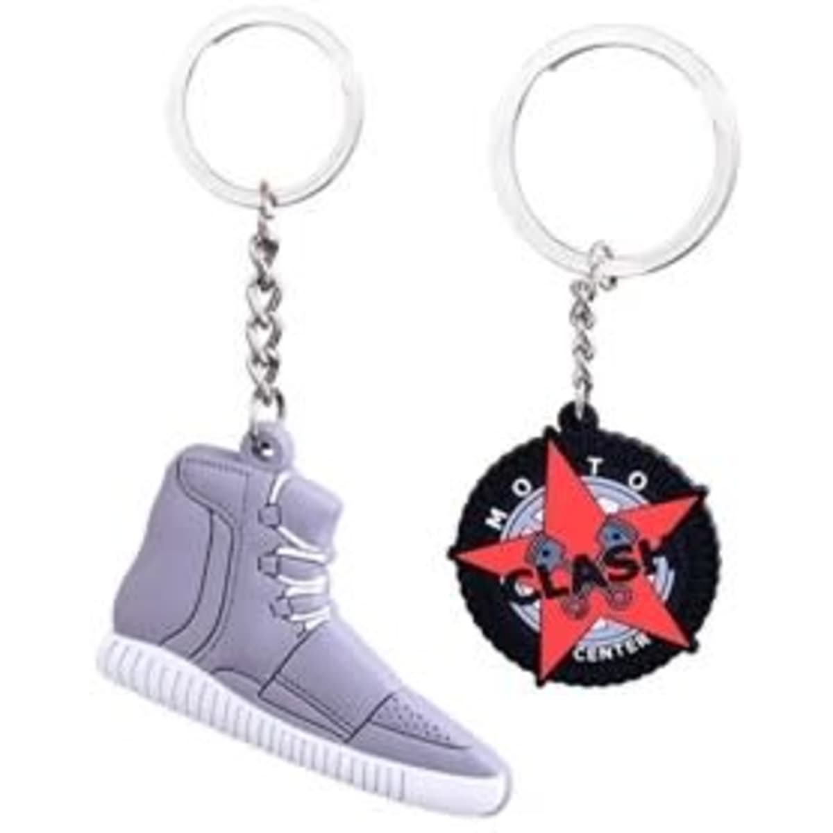 A 0.75" custom 2D PVC keychain featuring a grey sneaker and a circular red and black logo design with a keyring attachment.