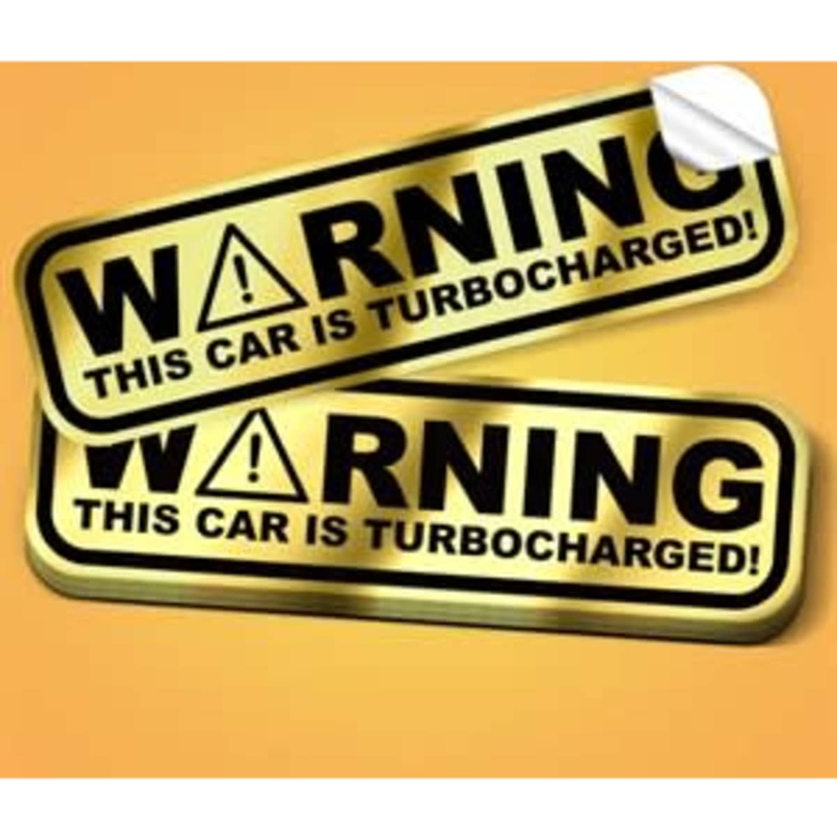 Gold bumper stickers with a decorative shape, featuring a warning about turbocharging. Includes logos.