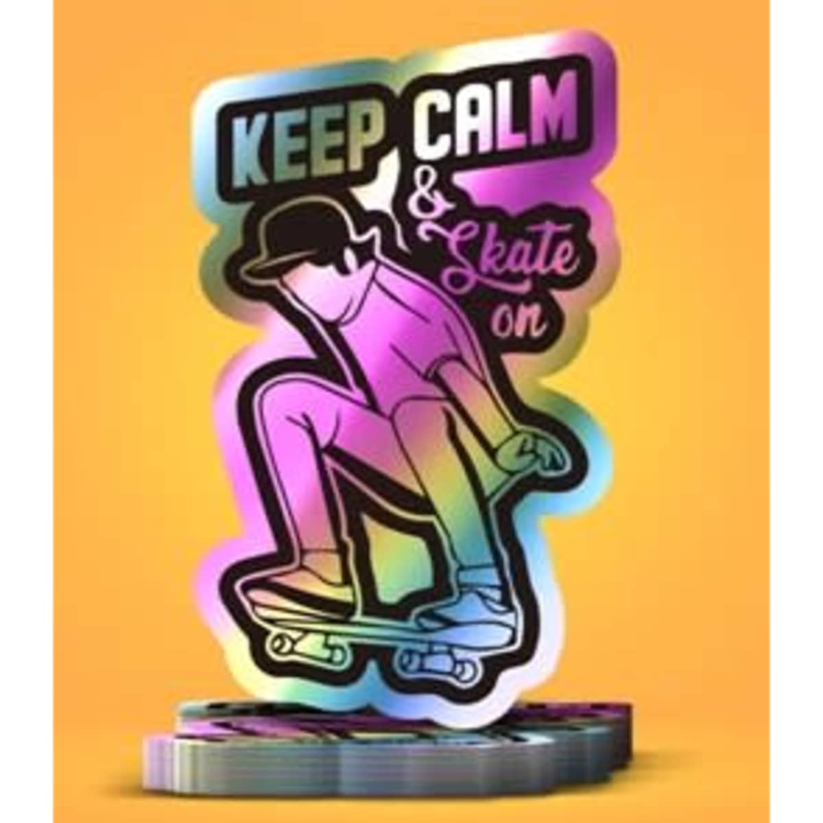 A holographic sticker featuring a skateboarder in vibrant colours, with the phrase "Keep Calm & Skate On" and a logo.