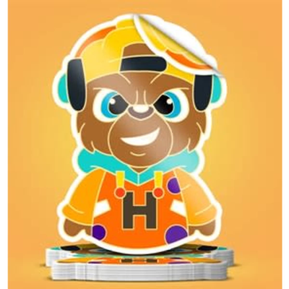 A vibrant, multi-coloured custom shape die cut sticker featuring a cartoon bear character wearing headphones and a cap.