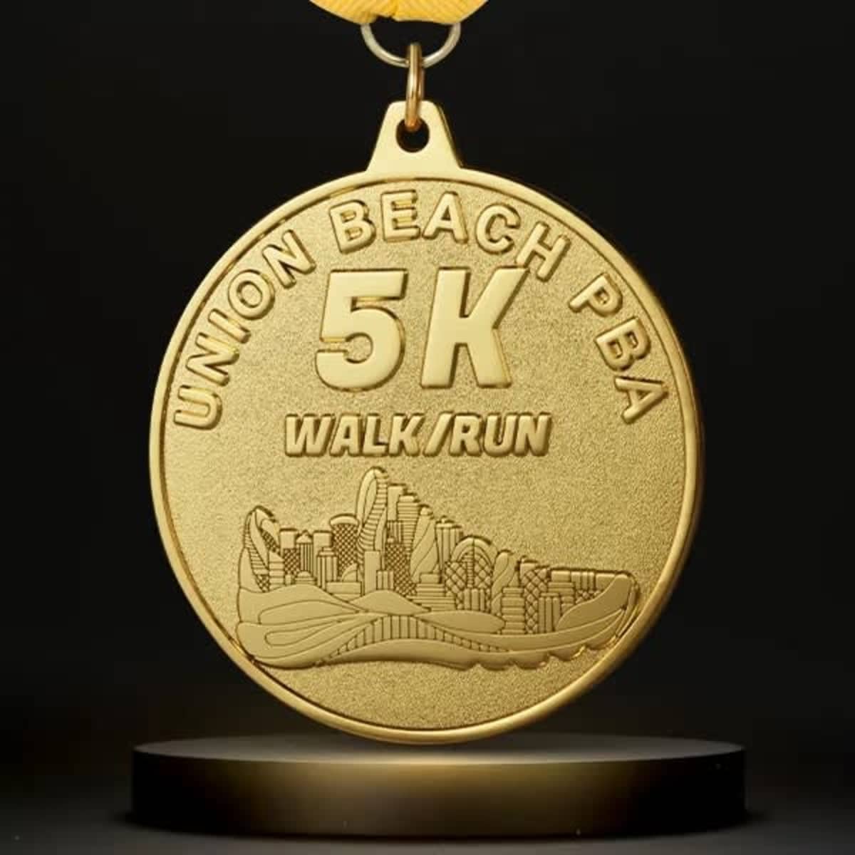 A gold medal featuring a textured background and running shoe design, with a logo at the top.