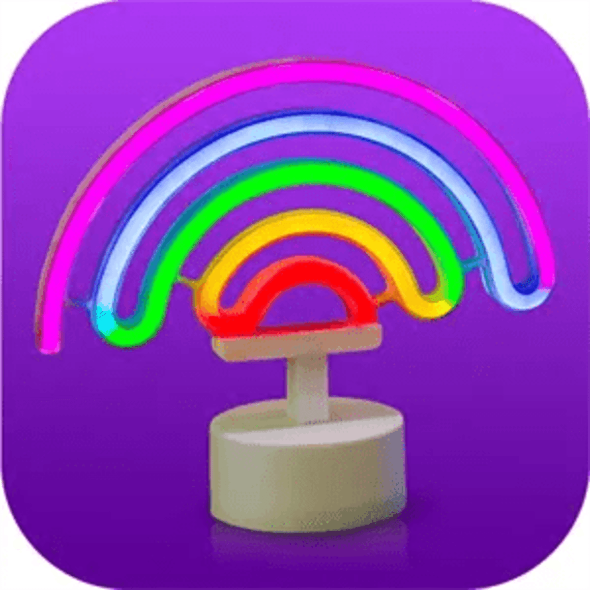 A neon sign shaped like a rainbow in vibrant colours, mounted on a white base.