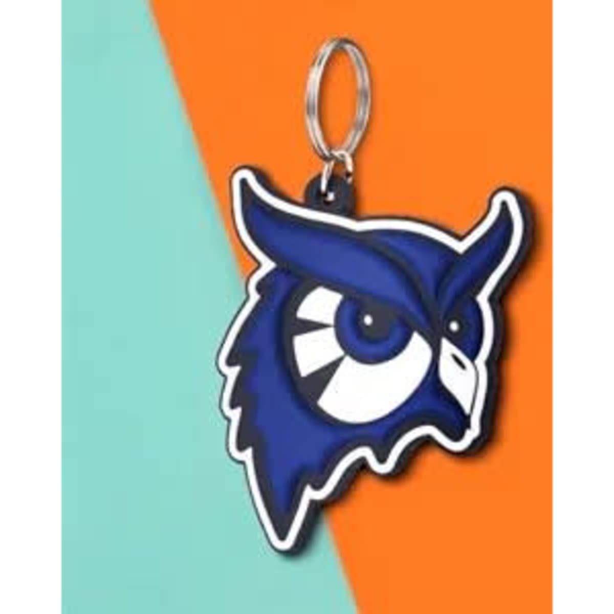 A blue and white 3D PVC keychain featuring an owl head design, attached to a silver keyring.
