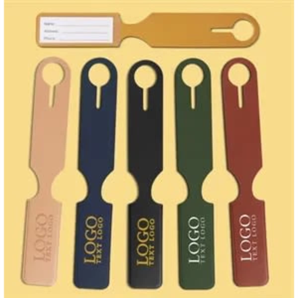 A set of premium PU leather luggage tags in beige, navy, green, and brown, each featuring a logo and a name tag area.