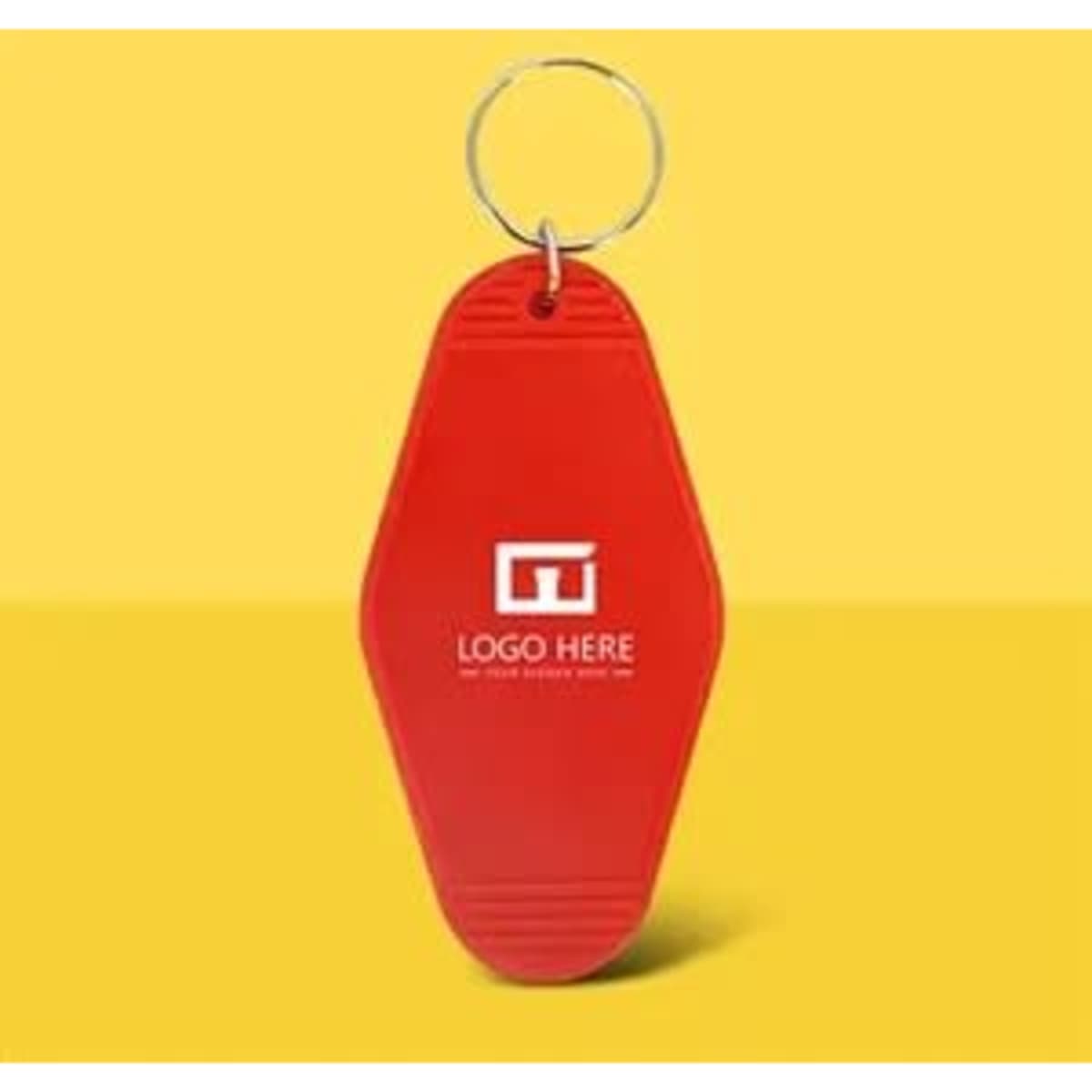 A red motel key tag with a keyring, featuring a logo on a yellow background.
